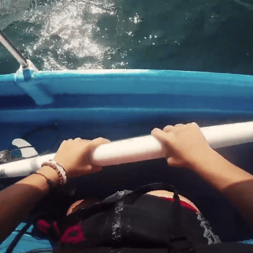 a woman sitting on a boat