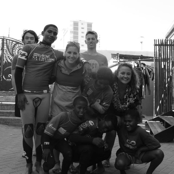 a group of people posing for the camera