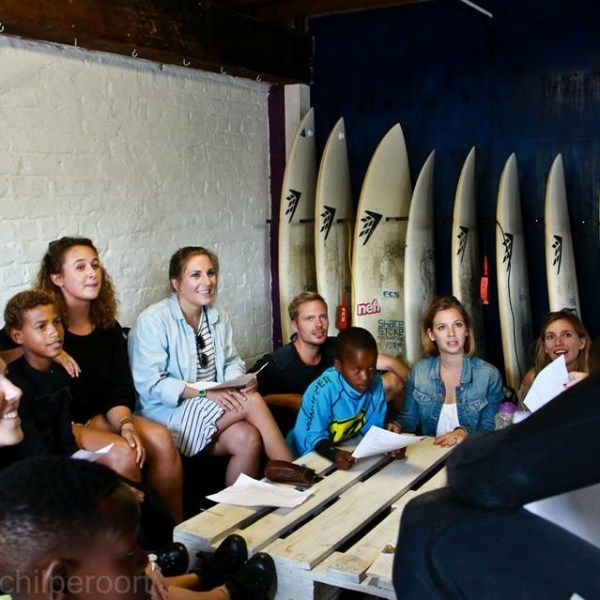 a group of people sitting at a table