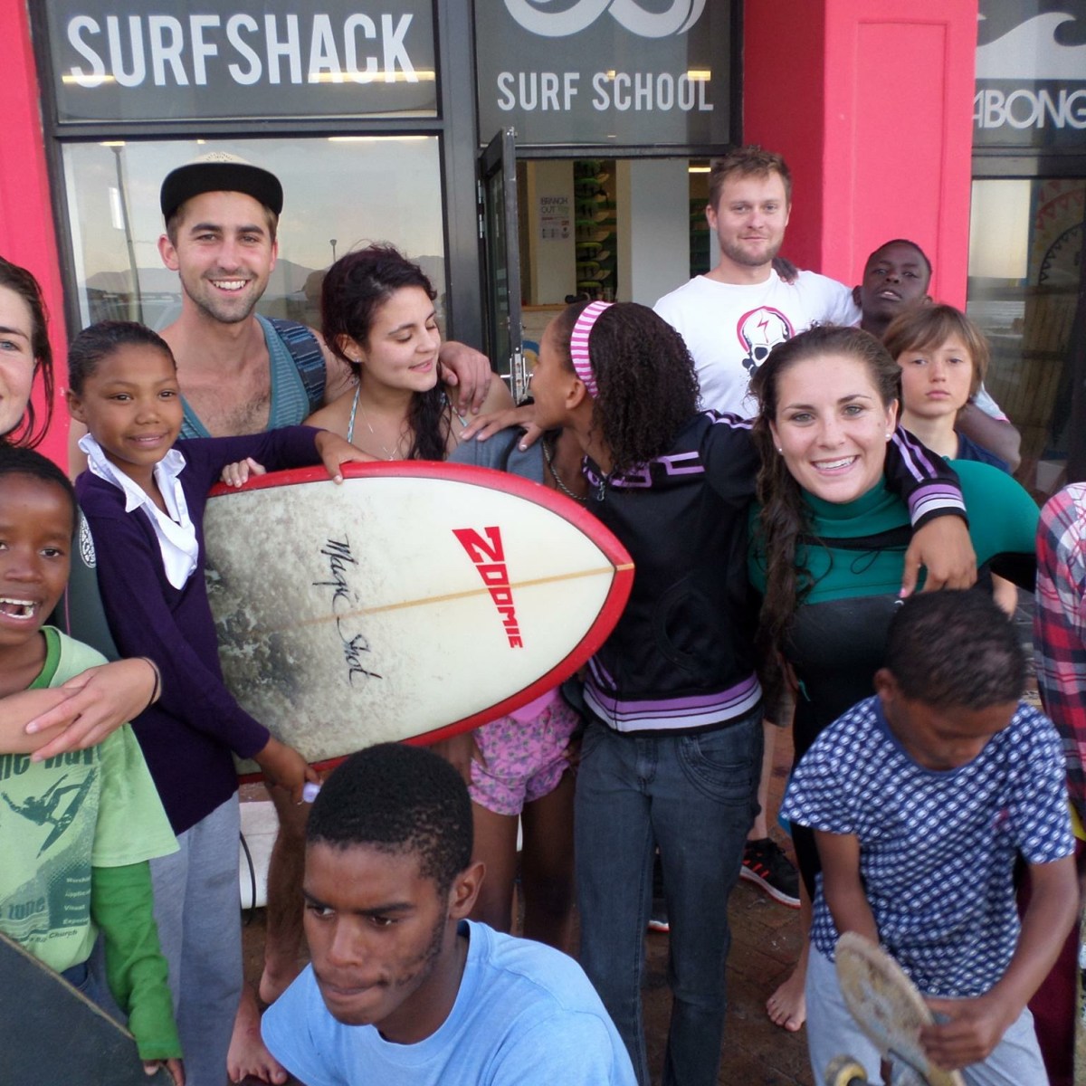 a group of people posing for a photo