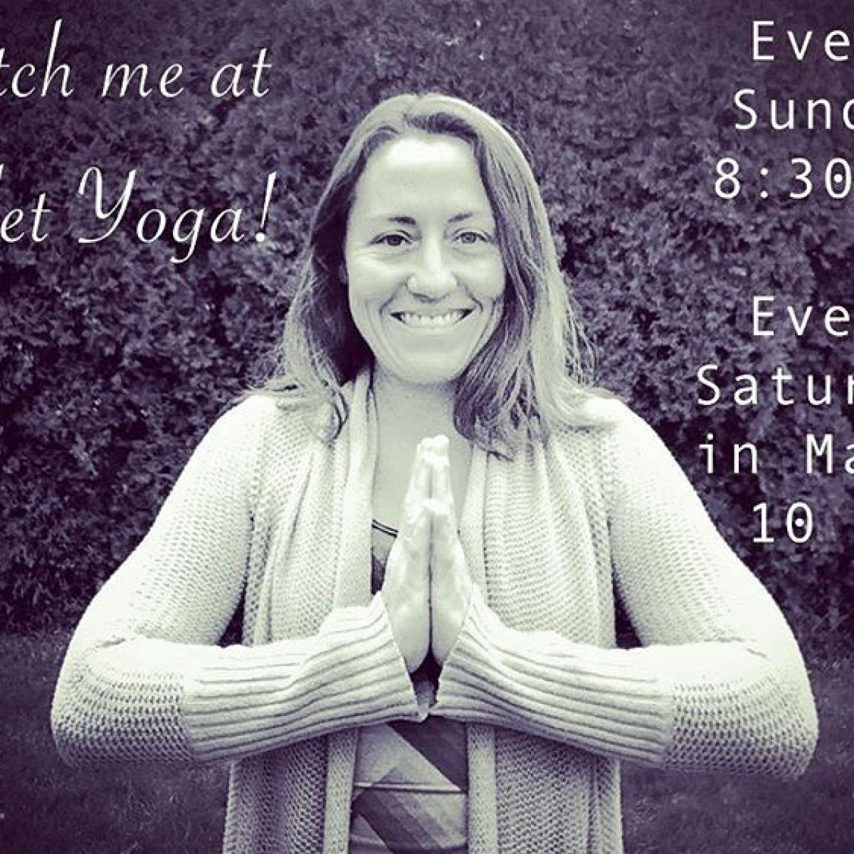 a woman holding a sign