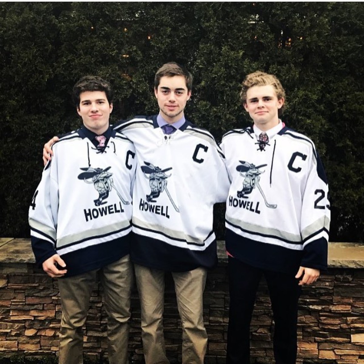 a group of people posing for a photo