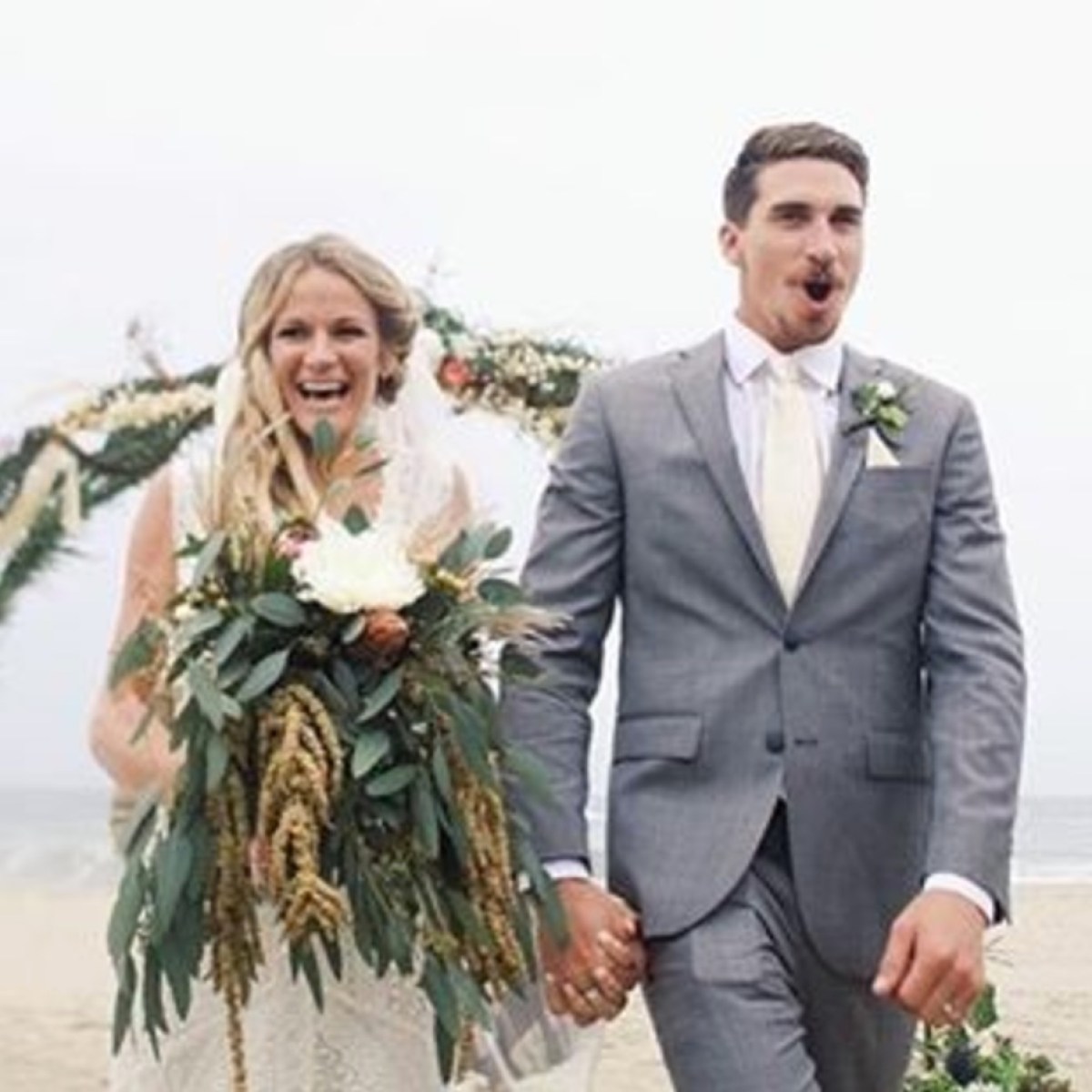 a man and a woman posing for a picture