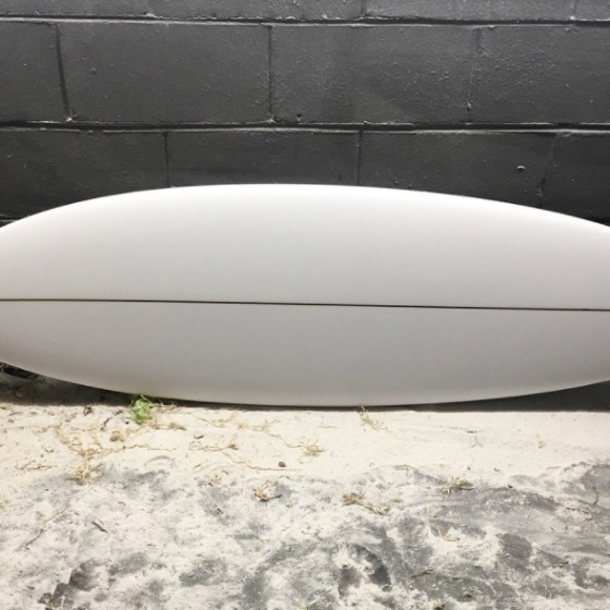 a beach with a surf board