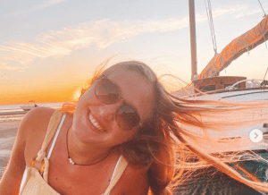 a woman sitting on a boat