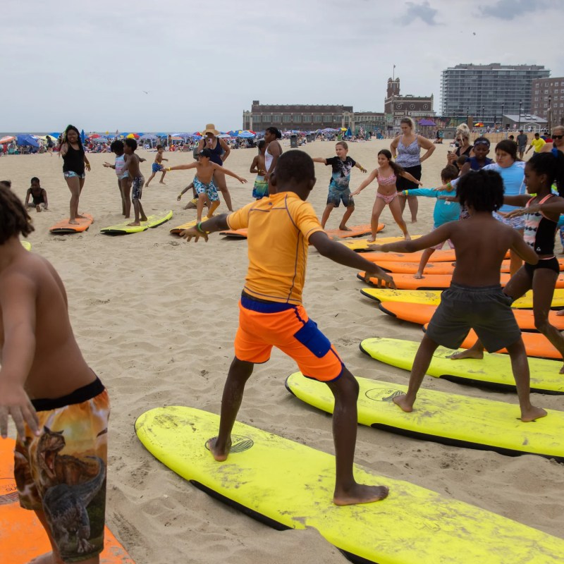 a group of people on a beach